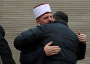 The Basic Court of Pristina delivers a verdict against the imam of the grand mosque Shefqet Krasniqi (L), who was indicted of influencing young Kosovars into joining radical Islamic groups through his lectures, in Pristina, Kosovo March 23, 2018. REUTERS/Hazir Reka