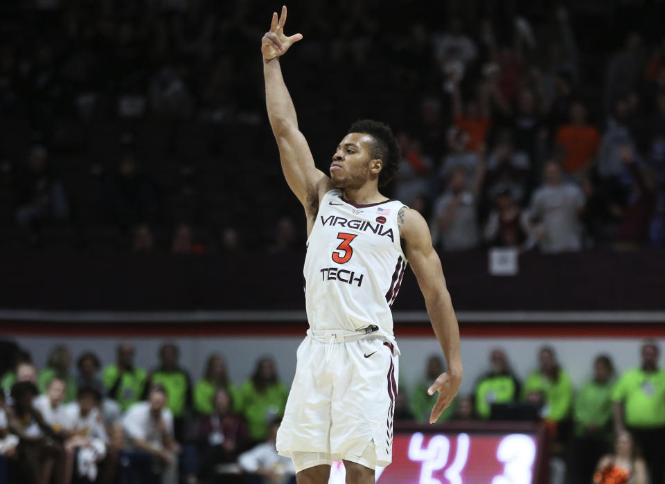 Virginia Tech's Wabissa Bede (3) celebrates a 3-point basket in the final minutes of an NCAA college basketball game against Chattanooga, Wednesday, Dec. 11, 2019, in Blacksburg, Va. Virginia Tech won 63-58. (Matt Gentry/The Roanoke Times via AP)