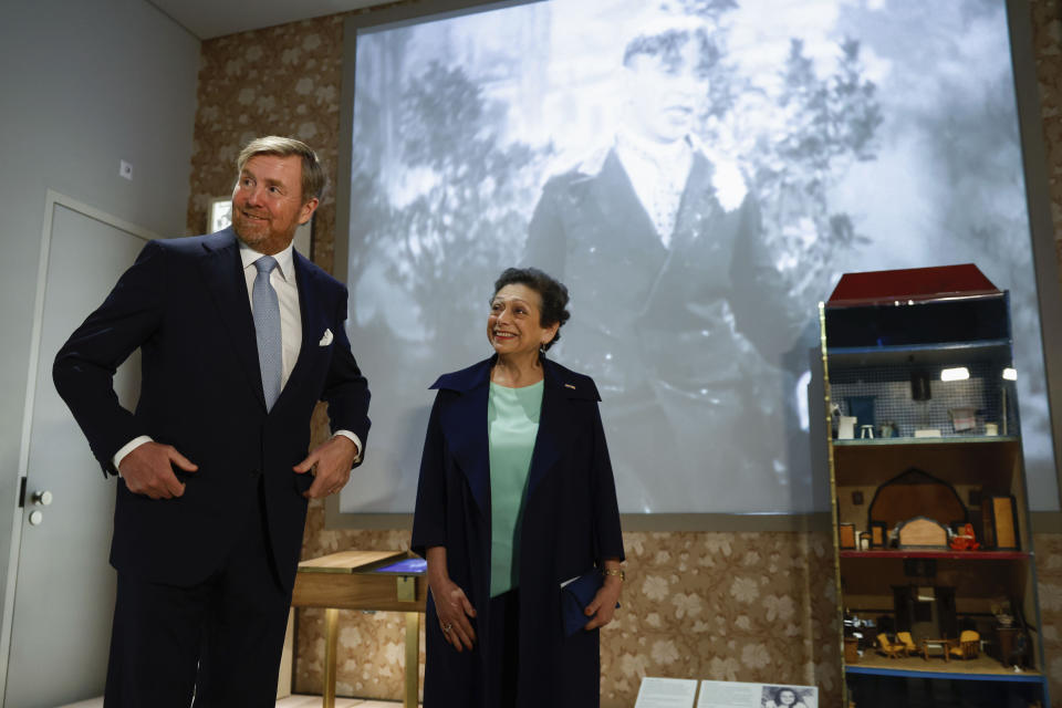 Netherlands' King Willem Alexander, left, tours the National Holocaust Museum in Amsterdam, Netherlands, Sunday, March 10, 2024. The Netherlands's National Holocaust Museum is opening on Sunday in a ceremony presided over by the Dutch king as well as Israeli President Isaac Herzog, whose presence is prompting protest because of Israel's deadly offensive against Palestinians in Gaza. (Piroschka van de Wouw/Pool Photo via AP)