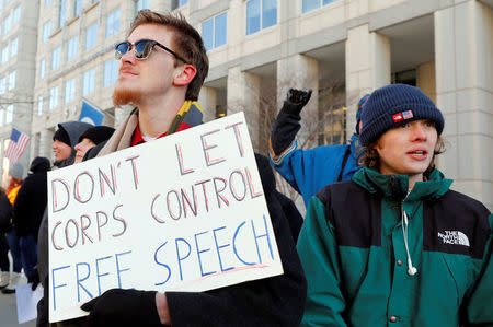 Net neutrality advocates rally in front of the Federal Communications Commission (FCC) ahead of Thursday's expected FCC vote repealing so-called net neutrality rules in Washington, U.S., December 13, 2017. REUTERS/Yuri Gripas