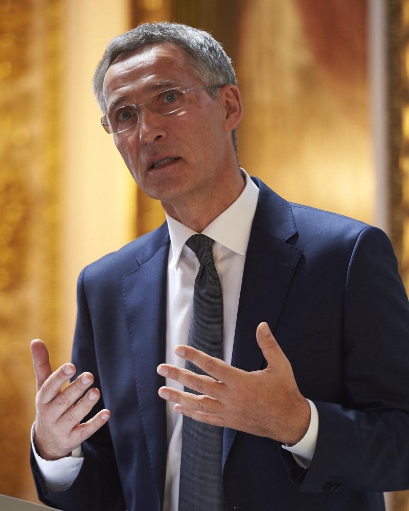 Jens Stoltenberg delivering his pre-summit address in London.