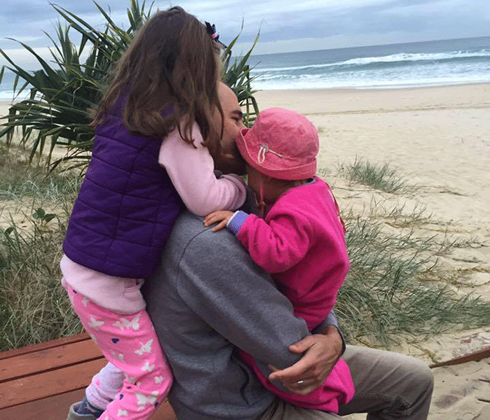 Gareth with his two daughters, Kate and Anna. Photo: Facebook