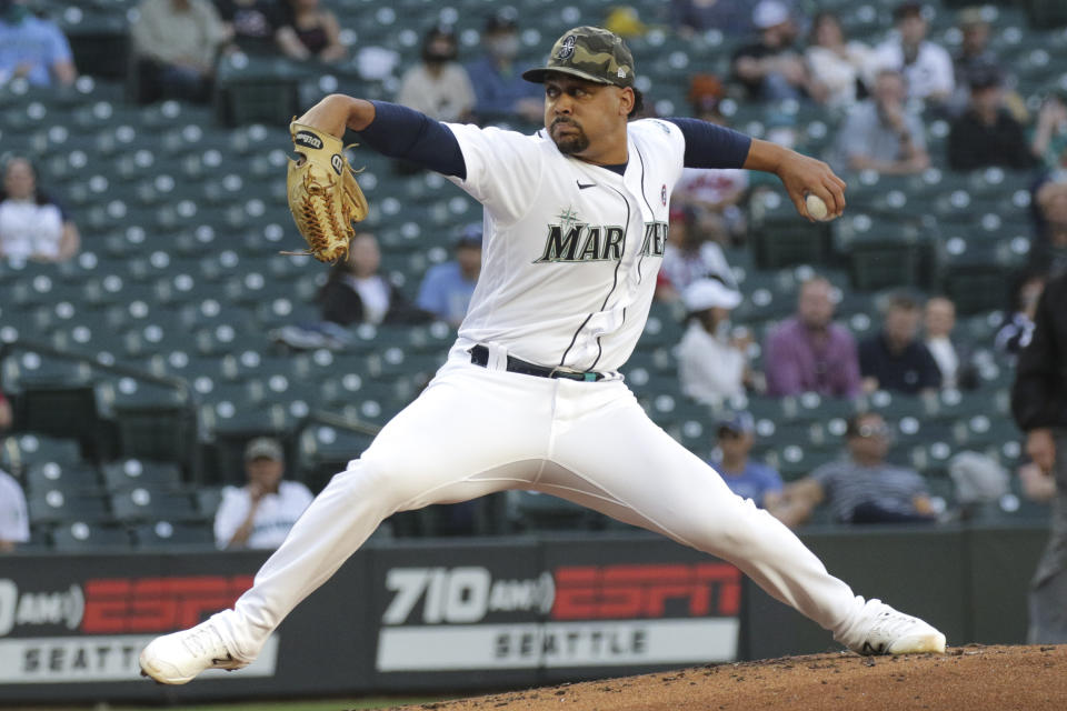 Seattle Mariners starting pitcher Justus Sheffield throws to a Cleveland Indians batter during the first inning of a baseball game Saturday, May 15, 2021, in Seattle. (AP Photo/Jason Redmond)