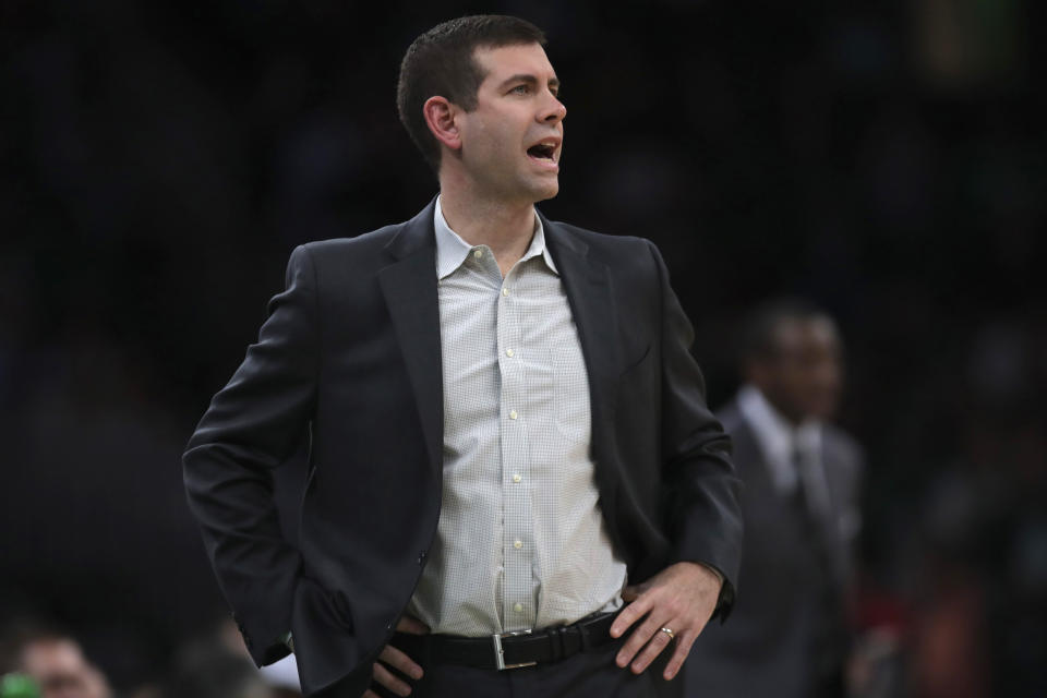 Boston Celtics coach Brad Stevens calls to his players during the first half of an NBA basketball game against the Detroit Pistons in Boston, Wednesday, Jan. 15, 2020. (AP Photo/Charles Krupa)