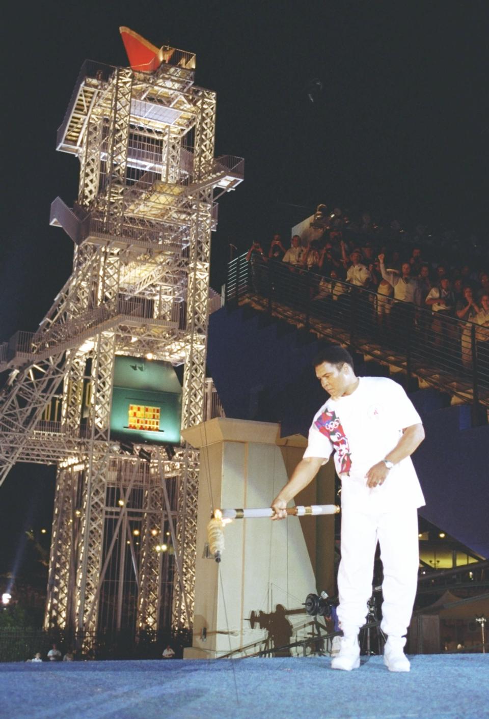 Boxing legend Muhammad Ali provided one of the most emotionally-charged moments of the modern Olympic Games when he lit the Olympic torch at the 1996 Atlanta Games. Ali, whose hands were shaking uncontrollably because of Parkinson's Disease, showed the world his will and heart were as strong as ever in this emotional and poignant moment.