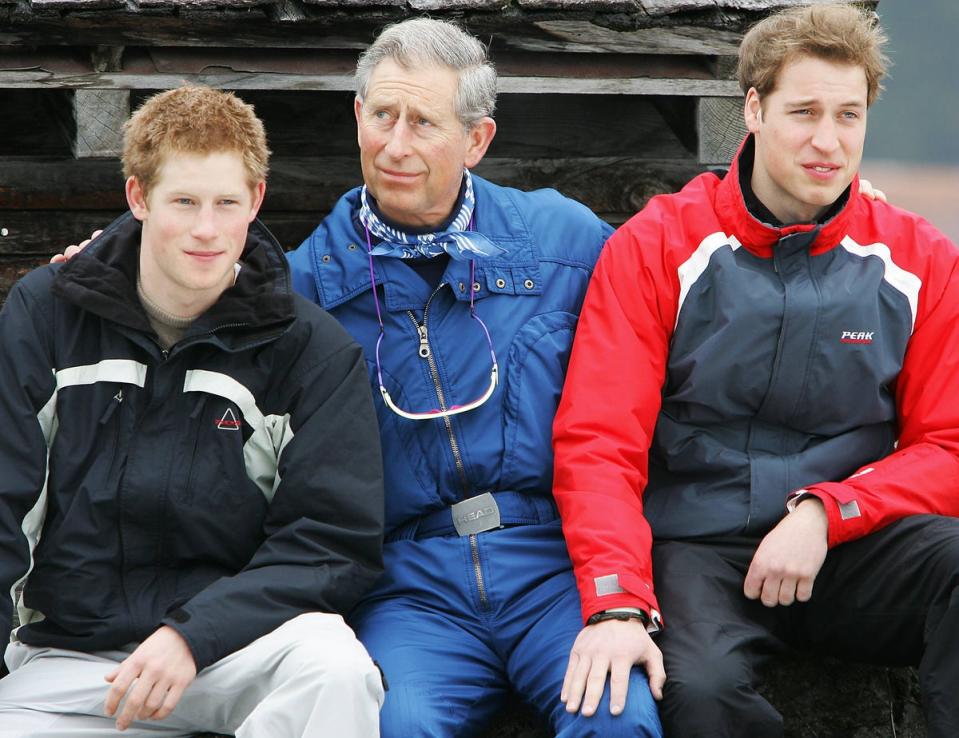 Prince Charles poses with Prince William and Prince Harry during their holidays in Klosters, Switzerland, 31 March 2005 (AFP via Getty Images)