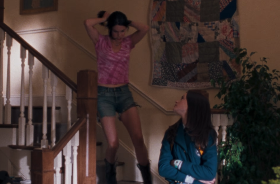 After a pilot episode of boring work suits and colorful sweaters, this is the first time we see Lorelai's real style in action. The pink tie-dye shirt! The Daisy Duke cutoffs! The cowboy boots! (Sure, they're fashionable now, but this was almost 20 years ago.) Lorelai's outfit quickly becomes a point of contention as she chooses to drop Rory off at her fancy new school wearing it, but it's a perfect time capsule of the year 2000.