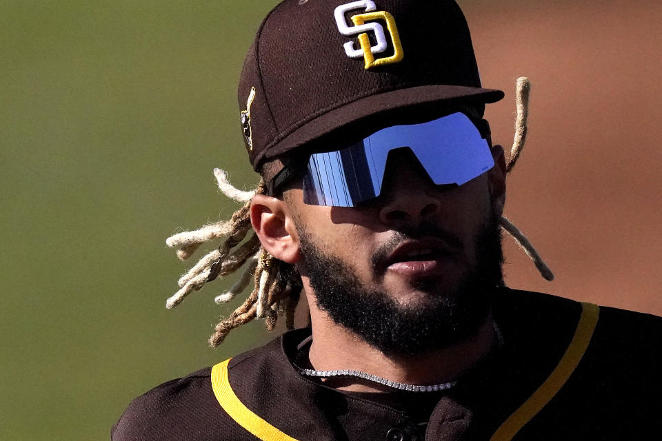 San Diego Padres' Fernando Tatis Jr. runs during San Diego Padres spring training baseball practice Saturday, Feb. 27, 2021, in Peoria, Ariz. (AP Photo/Charlie Riedel)