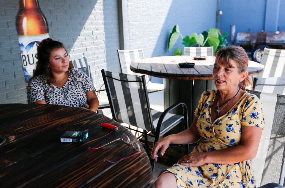 Caitlin Garrett and her mother, Angela Milton, own Archie's Lounge.
