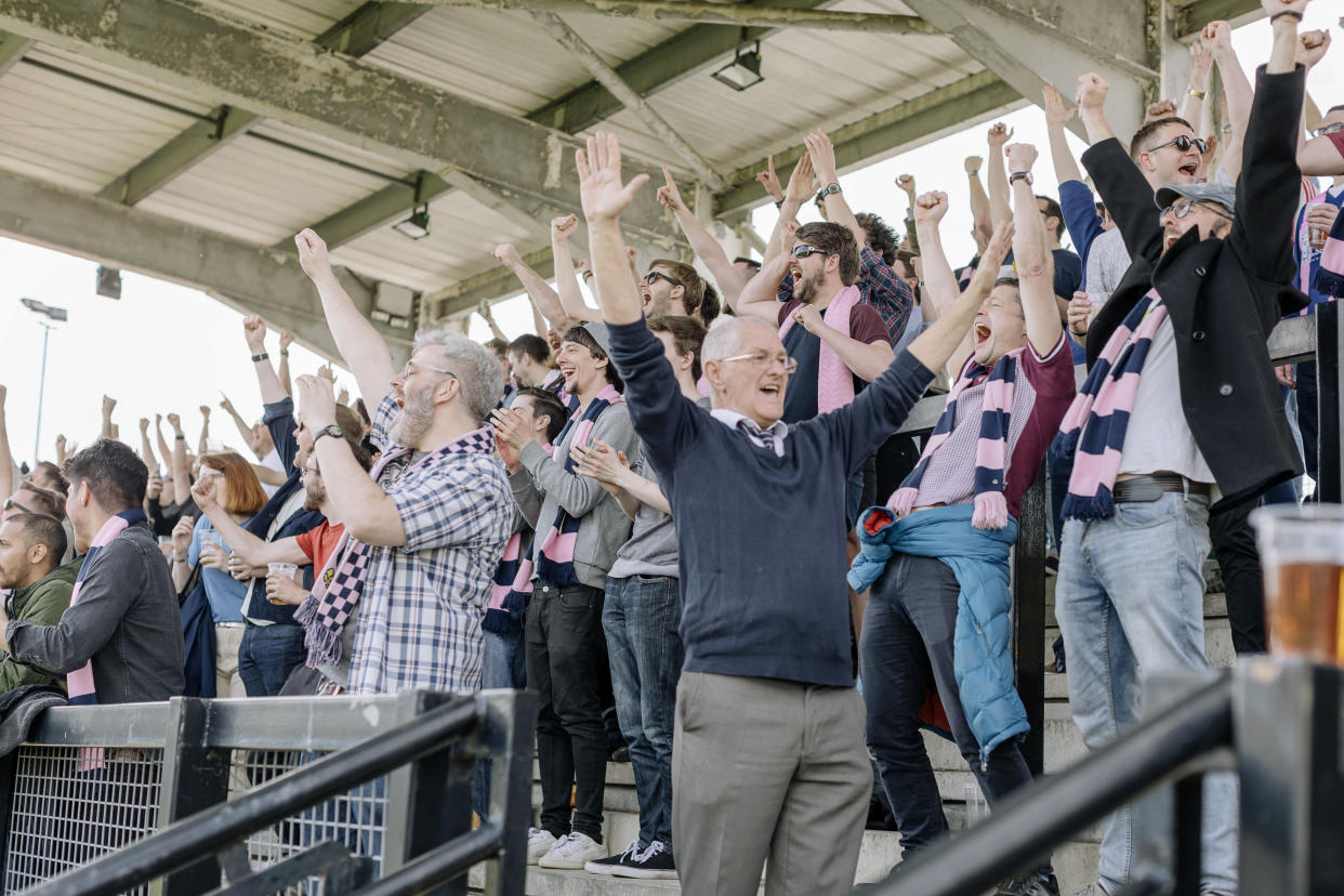 Dulwich Hamlet supporters celebrate a goal against Thurrock F.C. in an April match. (Photo: Orlando Gili)