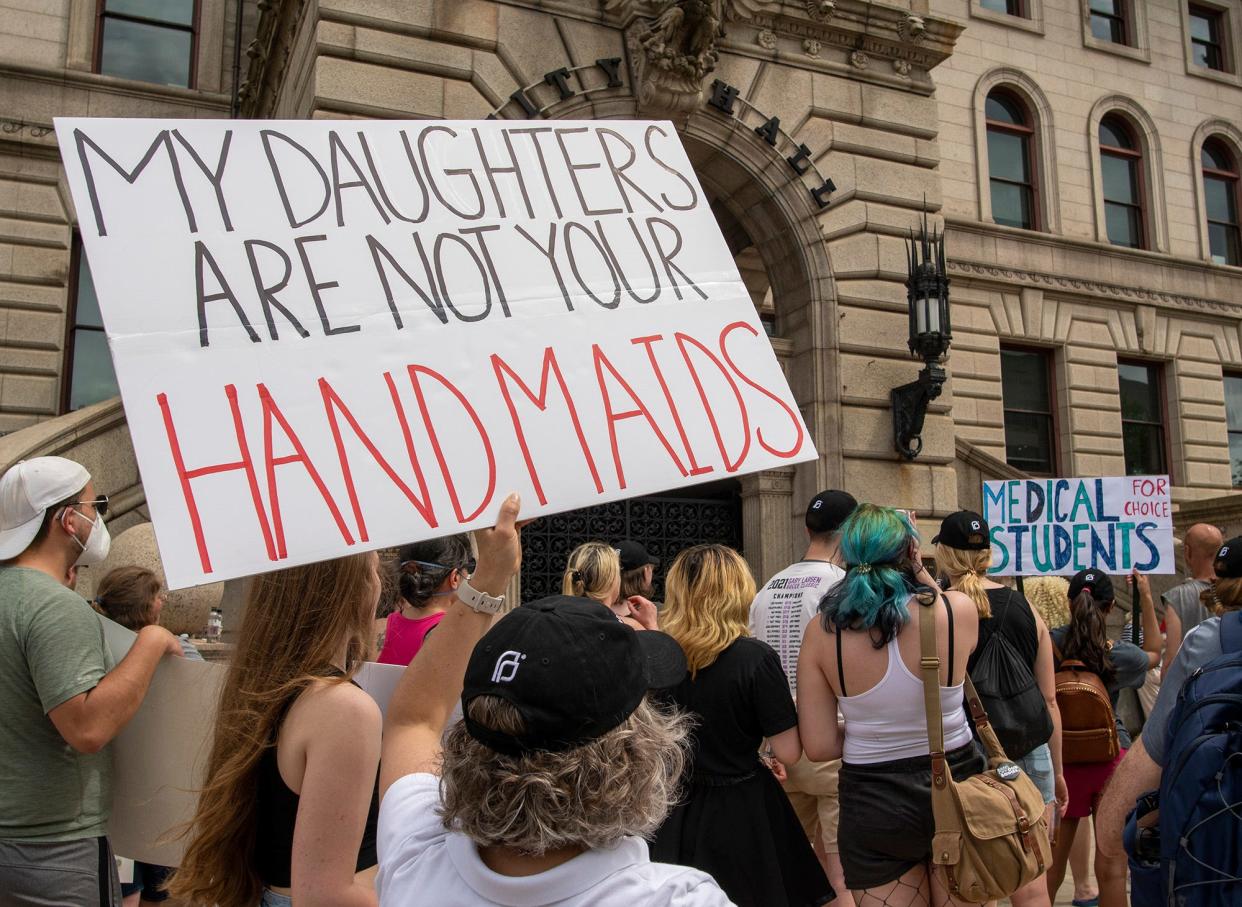 Protesters rally for abortion rights Saturday in front of City Hall.