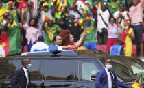 Cameroon's President Paul Biya and his wife Chantal Biya arrive at the Olembe stadium for the African Cup of Nations 2022 group A soccer match between Ethiopia and Cape Verde in Yaounde, Cameroon, Sunday, Jan. 9, 2022. (AP Photo/Themba Hadebe)