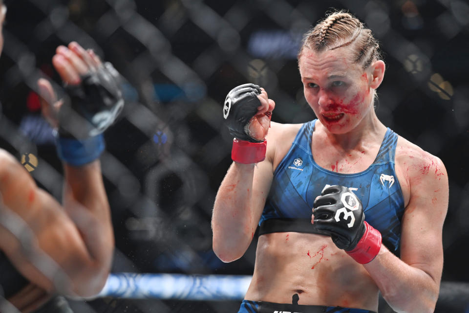 Aug 19, 2023; Boston, MA, USA; Andrea Lee (red gloves) fights Natalia Silva (blue gloves) during UFC 292 at TD Garden. Mandatory Credit: Bob DeChiara-USA TODAY Sports