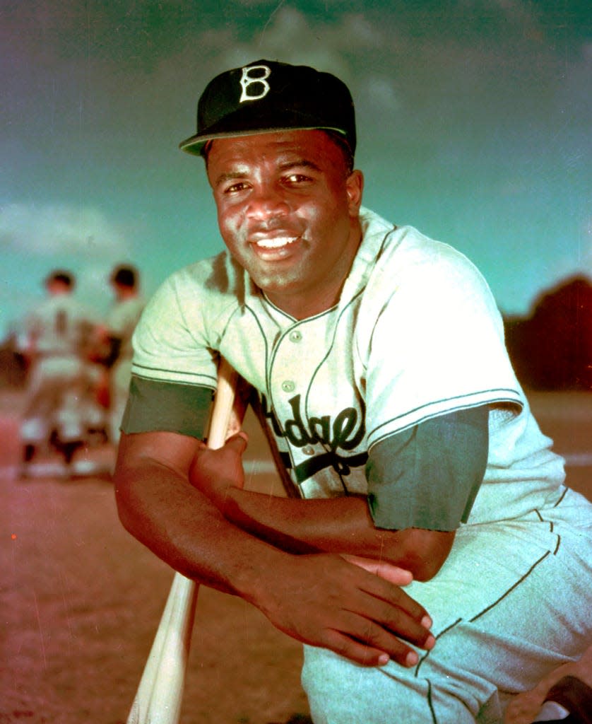 In this 1952 file photo, Brooklyn Dodgers baseball player Jackie Robinson poses.