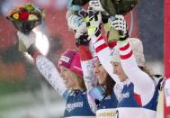 Alpine Skiing - FIS Alpine Skiing World Championships - Women's Alpine Combined - St. Moritz, Switzerland - 10/2/17 - Wendy Holdener of Switzerland is flanked by silver medalist Michelle Gisin of Switzerland (L) and Austria's bronze medal winner Michaela Kirchgasser of Austria after winning the gold medal in the Alpine Combined. REUTERS/Denis Balibouse - RTX30GDF