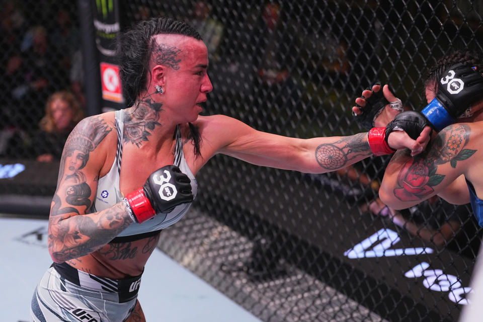 LAS VEGAS, NEVADA – JULY 15: (L-R) Ashlee Evans-Smith punches Ailin Perez of <a class="link " href="https://sports.yahoo.com/soccer/teams/argentina/" data-i13n="sec:content-canvas;subsec:anchor_text;elm:context_link" data-ylk="slk:Argentina;sec:content-canvas;subsec:anchor_text;elm:context_link;itc:0">Argentina</a> in their women’s bantamweight fight during the UFC Fight Night at UFC APEX on July 15, 2023 in Las Vegas, Nevada. (Photo by Jeff Bottari/Zuffa LLC via Getty Images)