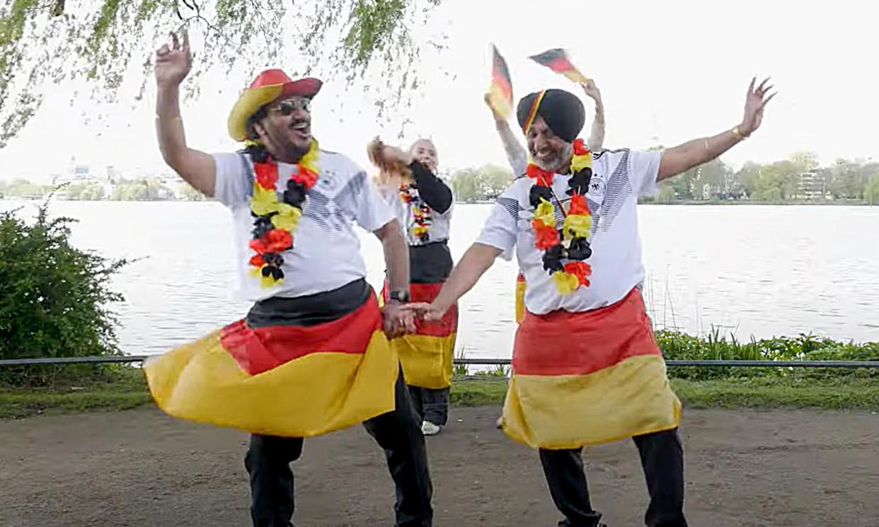 <span>Lovely (left) and Monty Bhangu dance by the shore of Lake Alster in the video for <em>Diese EM 2024</em>.</span><span>Photograph: YouTube</span>