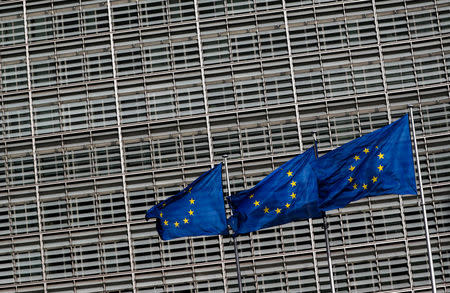 European Union flags flutter outside the EU Commission headquarters in Brussels, Belgium, March 12, 2018. REUTERS/Yves Herman