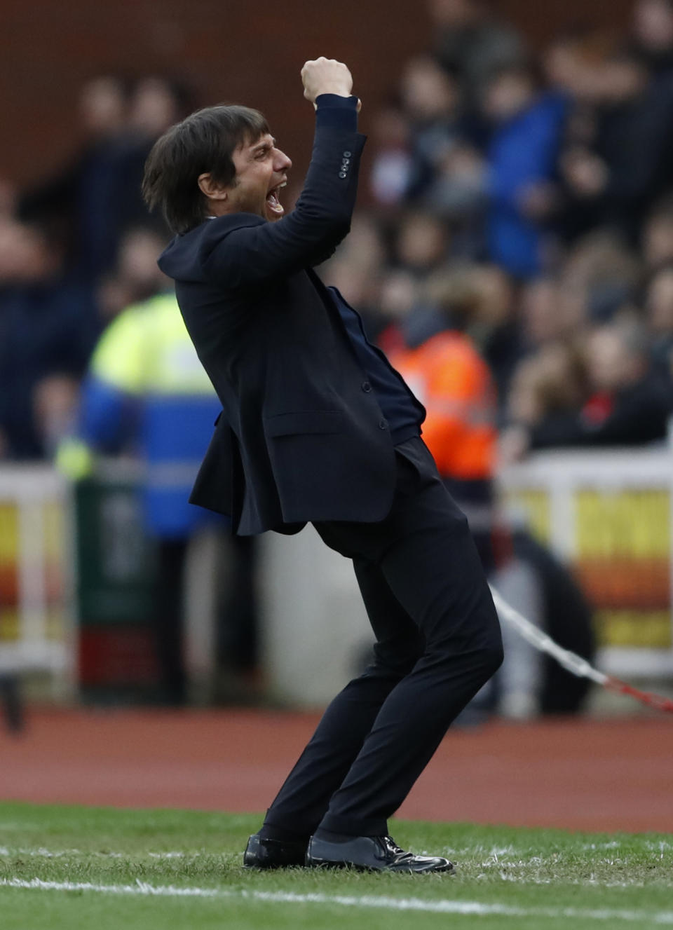 <p>Britain Football Soccer – Stoke City v Chelsea – Premier League – bet365 Stadium – 18/3/17 Chelsea manager Antonio Conte celebrates after the game Action Images via Reuters / Carl Recine Livepic EDITORIAL USE ONLY. No use with unauthorized audio, video, data, fixture lists, club/league logos or “live” services. Online in-match use limited to 45 images, no video emulation. No use in betting, games or single club/league/player publications. Please contact your account representative for further details. </p>