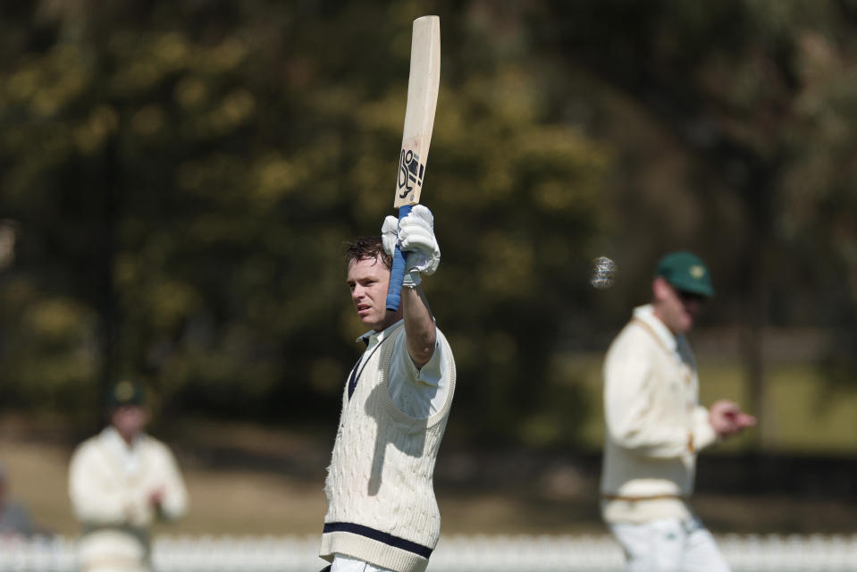 MELBOURNE, AUSTRALIA - OCTOBER 08: Marcus Harris of Victoria raises his bat after making a century during the Sheffield Shield match between Victoria and Tasmania at CitiPower Centre, on October 08, 2024, in Melbourne, Australia. (Photo by Daniel Pockett/Getty Images)