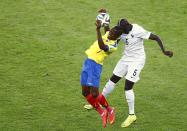 France's Mamadou Sakho (R) challenges Ecuador's Enner Valencia as they fight for the ball during their 2014 World Cup Group E soccer match at the Maracana stadium in Rio de Janeiro June 25, 2014. REUTERS/Ricardo Moraes