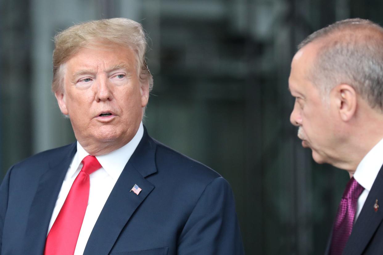 FILE PHOTO: U.S. President Donald Trump talks to Turkey’s President Recep Tayyip Erdogan at NATO headquarters in Brussels, Belgium July 11, 2018. Tatyana Zenkovich/Pool via REUTERS/File Photo