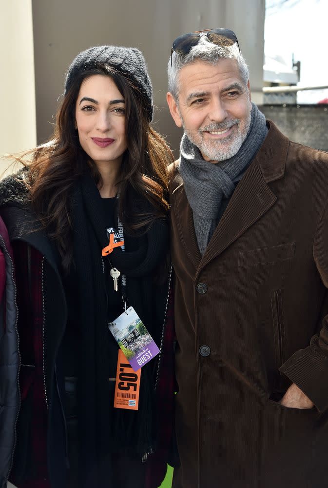 George and Amal Clooney at the march