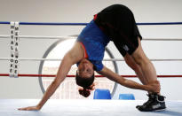 Iranian boxer Sadaf Khadem attends a training session in preparation to her first official boxing bout in Royan, France, April 11, 2019. REUTERS/Regis Duvignau