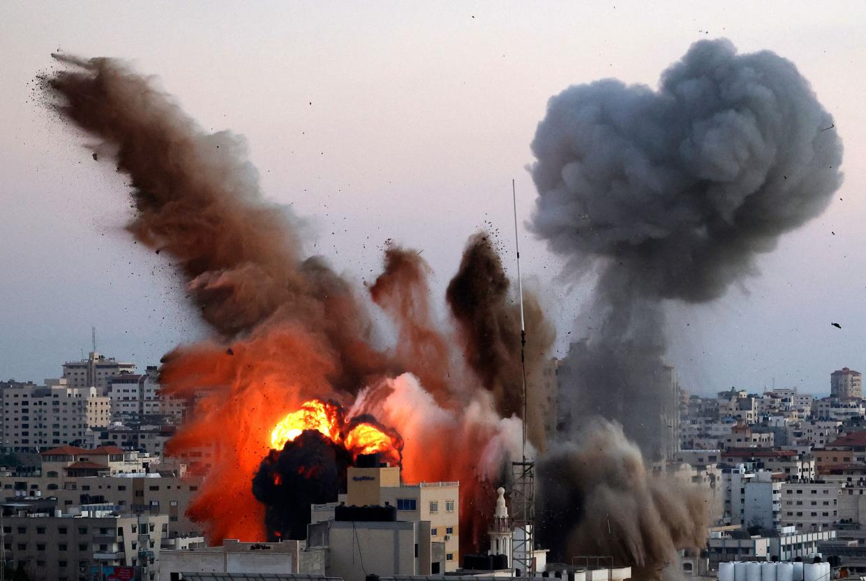 Smoke billows after an Israeli airstrike on Gaza City targeted the Ansar compound, linked to the Hamas movement, in the Gaza Strip on Friday. 