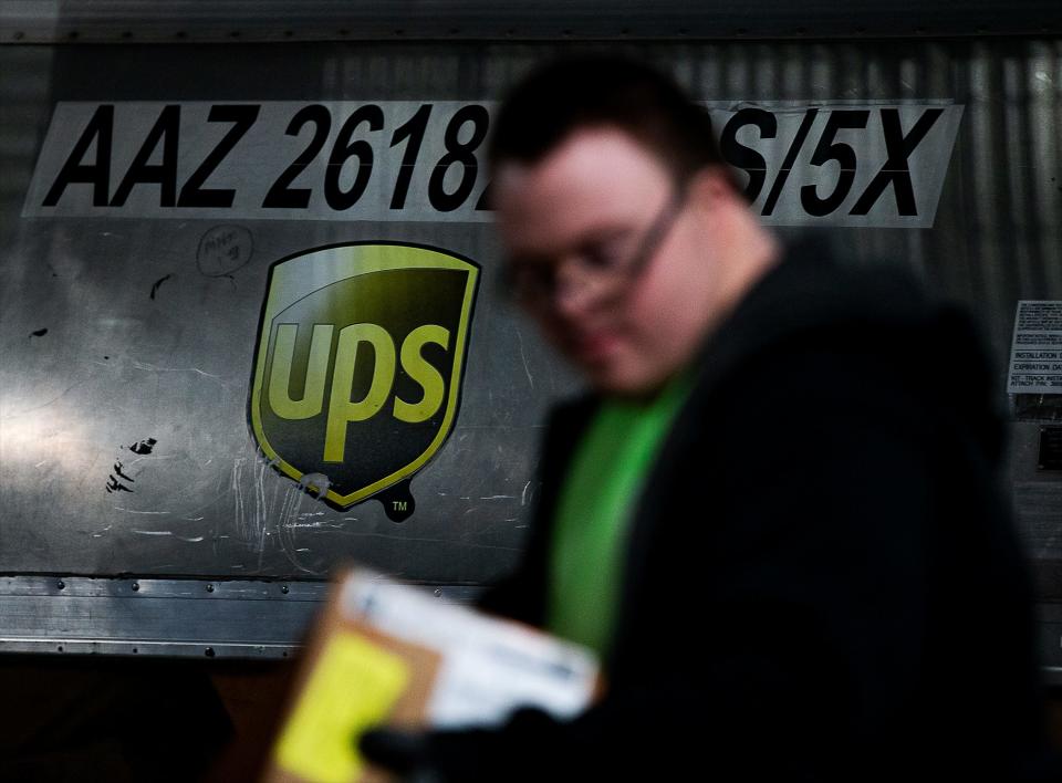 Preston Haggerman loaded packages onto a conveyor belt during a recent shift at the UPS Worldport facility in Louisville, Ky. Haggerman was hired on through the UPS Transitional Learning Center for people with physical or intellectual disabilities and is now working hard and earning his own money. Feb. 7, 2023