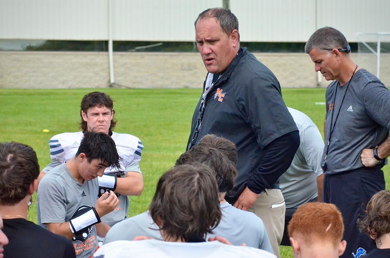 Marine City coach Daryn Letson talks to his players after football practice on Friday, Aug. 13, 2021.