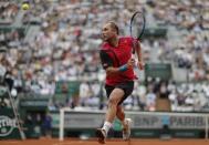 Tennis - French Open - Roland Garros - Novak Djokovic of Serbia vs Steve Darcis of Belgium - Paris, France - 26/05/16. Darcis runs for the ball. REUTERS/Gonzalo Fuentes