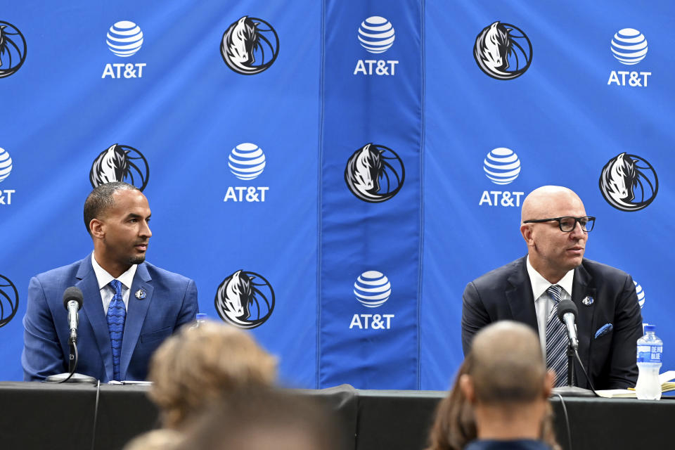 New Dallas Mavericks NBA basketball team general manager Nico Harrison, left, and new head coach Jason Kidd, right, are shown at an introductory press conference in Dallas, Thursday, July 15, 2021. (AP Photo/Matt Strasen)