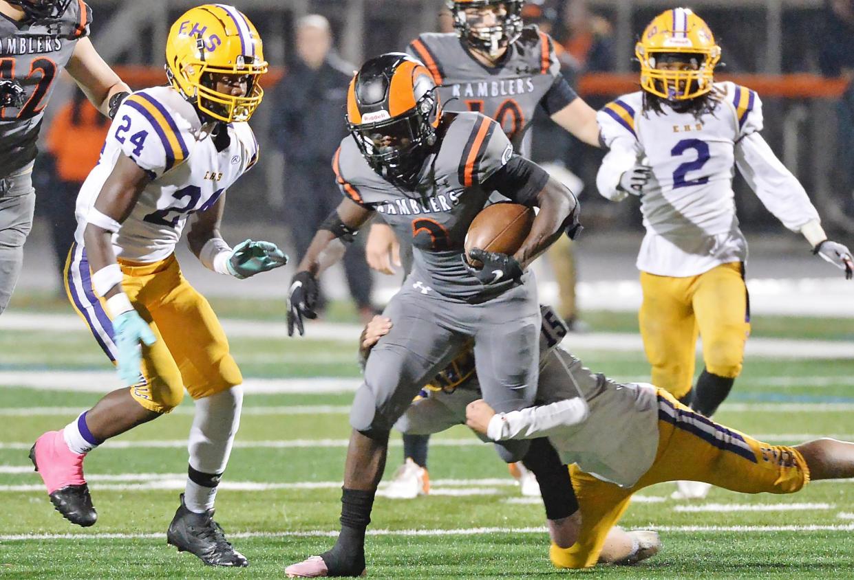 Cathedral Prep junior Dajoure Hollingsworth runs the football between Erie High defenders during an Oct. 20 football game at Dollinger Field. Hollingsworth was named to the 2023 Pennsylvania Football Writers' Class 5A All-State Team for that position.