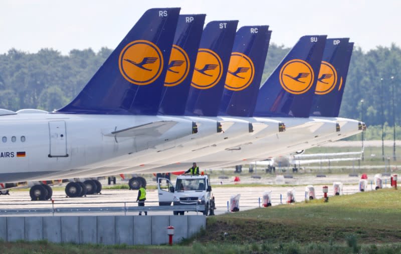 FILE PHOTO: Lufthansa planes parked at the Berlin Schoenefeld airport