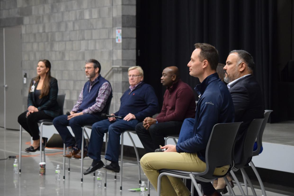 Panelists from CoxHealth, Mercy Springfield Communities and the community listen to questions during a Wednesday, Dec. 13, 2023, listening session about Springfield's prospective pediatric hospital.