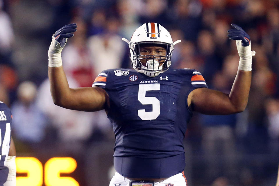 Auburn defensive tackle Derrick Brown (5) reacts after a stop against Georgia during the second half of an NCAA college football game, Saturday, Nov. 16, 2019, in Auburn, Ala. (AP Photo/Butch Dill)