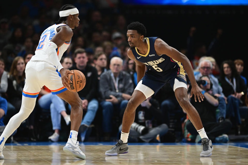 OKLAHOMA CITY, OKLAHOMA - NOVEMBER 1: Herbert Jones #5 of the New Orleans Pelicans plays defense against Shai Gilgeous-Alexander #2 of the Oklahoma City Thunder during the first half at Paycom Center on November 1, 2023 in Oklahoma City, Oklahoma. NOTE TO USER: User expressly acknowledges and agrees that, by downloading and or using this photograph, User is consenting to the terms and conditions of the Getty Images License Agreement. (Photo by Joshua Gateley/Getty Images)