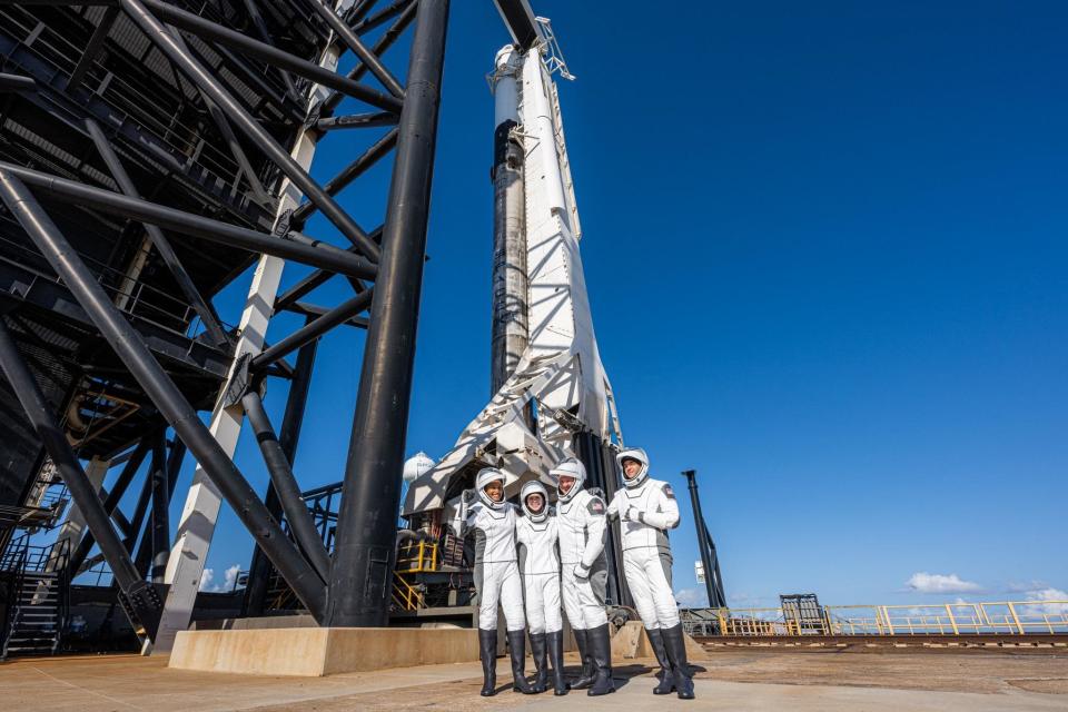 The Inspiration4 crew poses at the base of the Falcon 9 rocket before strapping in for launch. Left to right: Sian Proctor, Hayley Arceneaux, Chris Sembroski and mission commander Jared Isaacman, the billionaire who paid for the first privately funded trip to orbit. / Credit: SpaceX