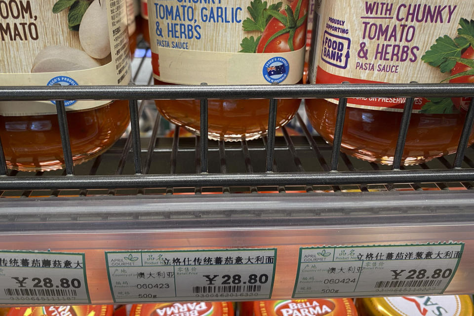 A jar of spaghetti sauce emblazoned with an Australian flag is displayed on a shelf at a supermarket in Beijing, Friday, May 12, 2023. Australia's Trade and Tourism Minister Don Farrell appears to be making progress in restoring a nearly decade-long rift in relations with China during a visit to Beijing. Farrell was holding meetings and visiting businesses on Friday in a sign that relations were getting back on track. (AP Photo/Mark Schiefelbein)