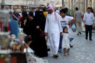 People shop at Souq Waqif market in Doha, Qatar August 30, 2016. REUTERS/Naseem Zeitoon