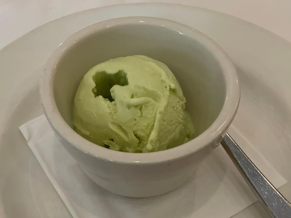 pistachio gelato in a cup at a chain restaurant