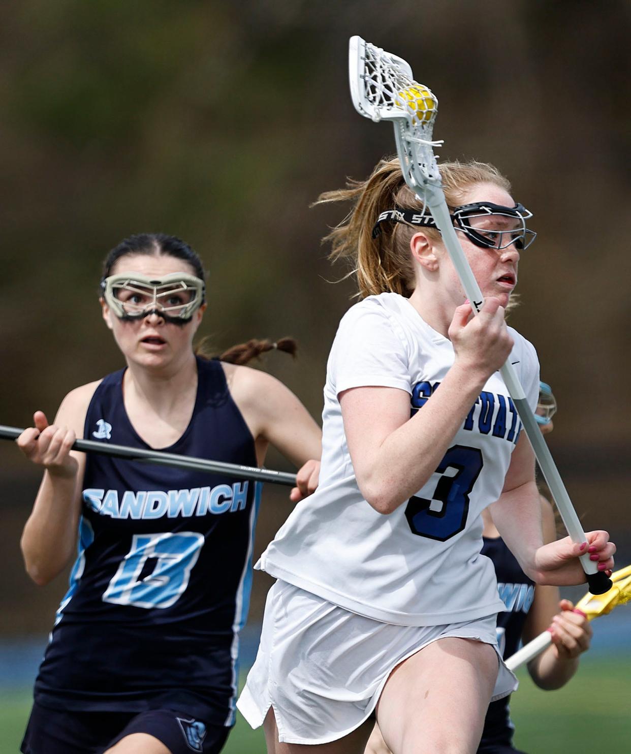 Kate Stone of Scituate tries to set up for a shot on the Sandwich net.

Scituate girls lacrosse plays Sandwich on Friday April 19, 2024