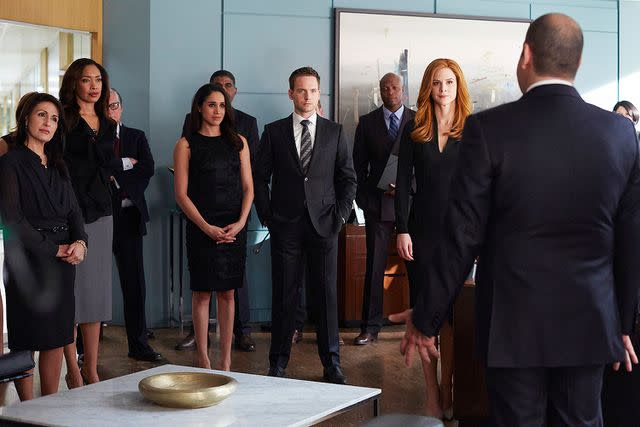 <p>Shane Mahood/USA Network/NBCU Photo Bank/NBCUniversal via Getty </p> Gina Torres, Meghan Markle, Patrick J. Adams, Sarah Rafferty and Rick Hoffman on 'Suits'