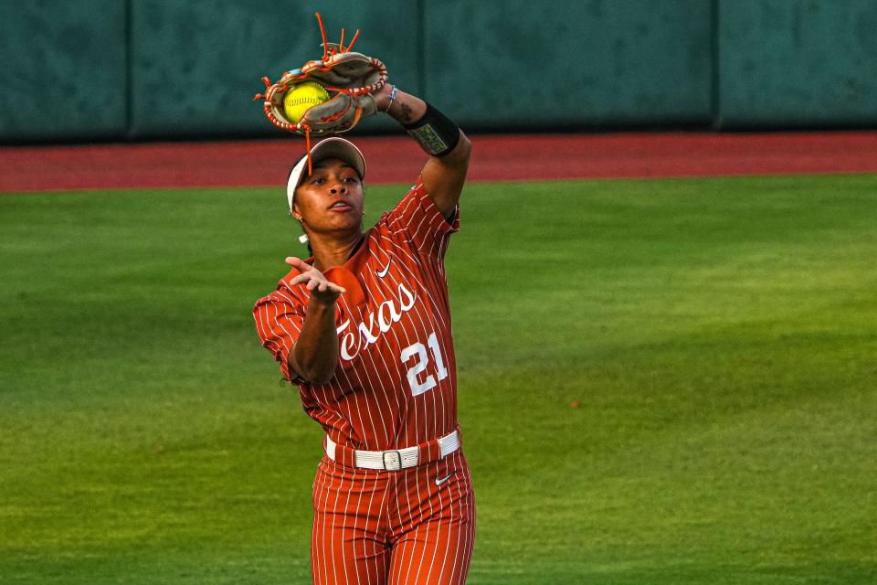 Texas Longhorns outfielder Kayden Henry catches a fly ball during Game 3 of the NCAA super regional against Texas A&M at McCombs Field on Sunday. The Longhorns had three errors in the series, but the Aggies had six in the two Texas victories.