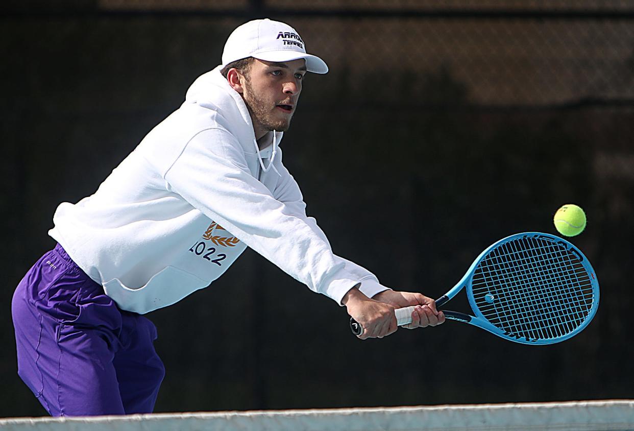 Watertown's Jadon Lindner hits a backhand shot Friday during the final day of the state Class AA high school boys tennis tournament at Rapid City. The Arrows took fifth in the two-day tourney.