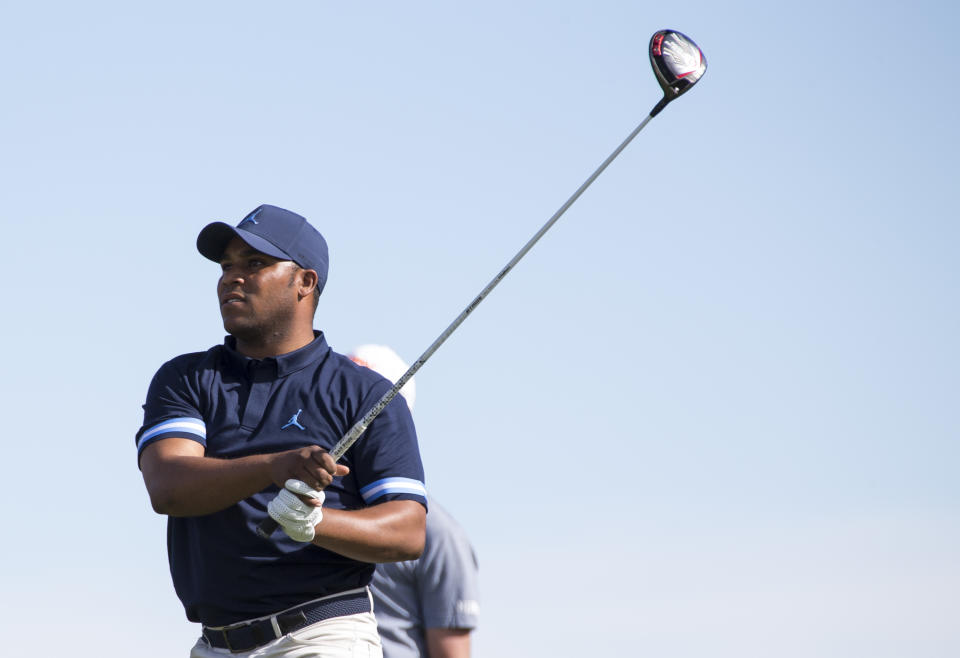 Professional golfer Harold Varner III watches his drive from the 18th tee box during the first round of the Shriners Hospitals For Children Open golf tournament at TPC at Summerlin in Las Vegas on Thursday, Nov. 1, 2018. (Richard Brian/Las Vegas Review-Journal via AP)