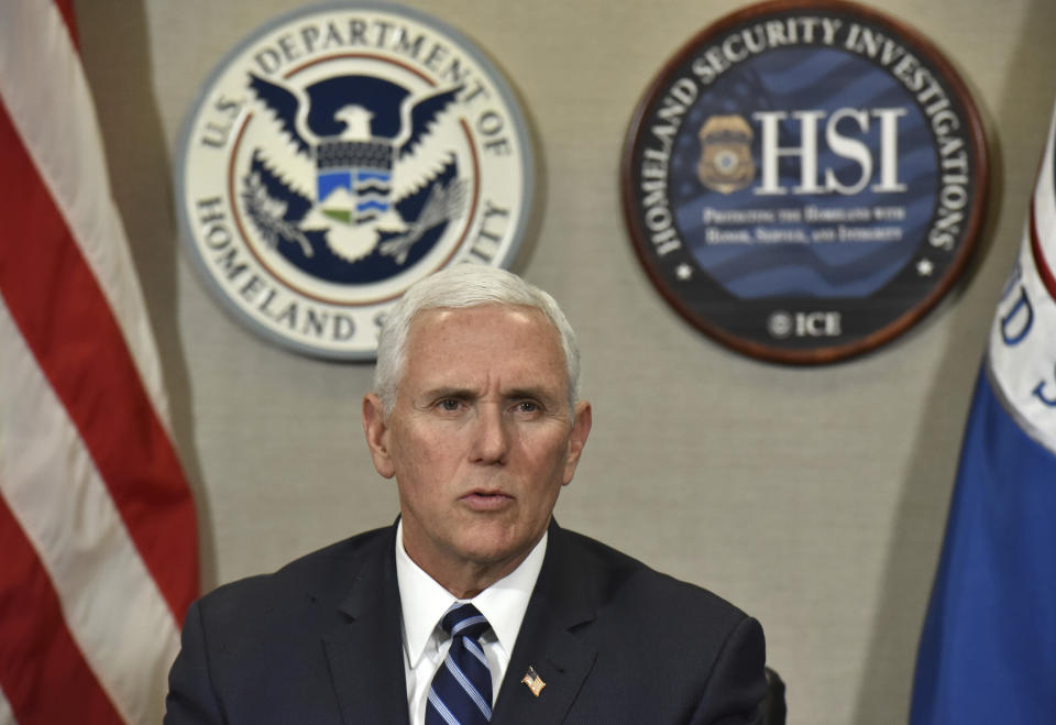 Vice President Mike Pence talks with ICE top officials before he receives a briefing at Homeland Security Investigation Principal Field Offices in Atlanta on Thursday, March 21, 2019. (Hyosub Shin/Atlanta Journal-Constitution via AP, Pool)