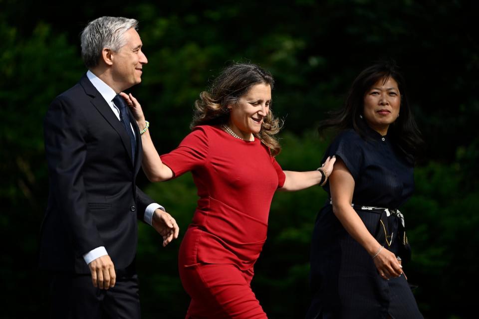 Francois-Philippe Champagne, left to right, Chrystia Freeland and Mary Ng arrive for a cabinet swearing-in ceremony at Rideau Hall in Ottawa on Wednesday, July 26, 2023. 