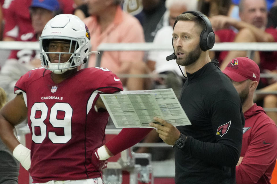 Arizona Cardinals head coach Kliff Kingsbury watches during the first half of an NFL football game against the Los Angeles Rams, Sunday, Sept. 25, 2022, in Glendale, Ariz. (AP Photo/Rick Scuteri)